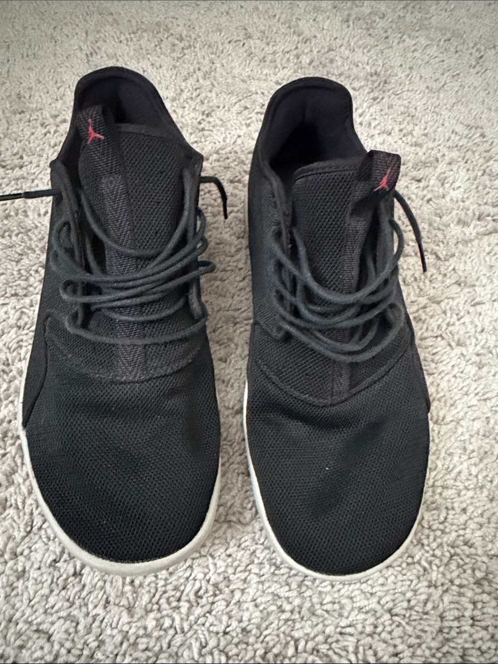 Jordan Men’s Black Sneakers with Red Jumpman Accent